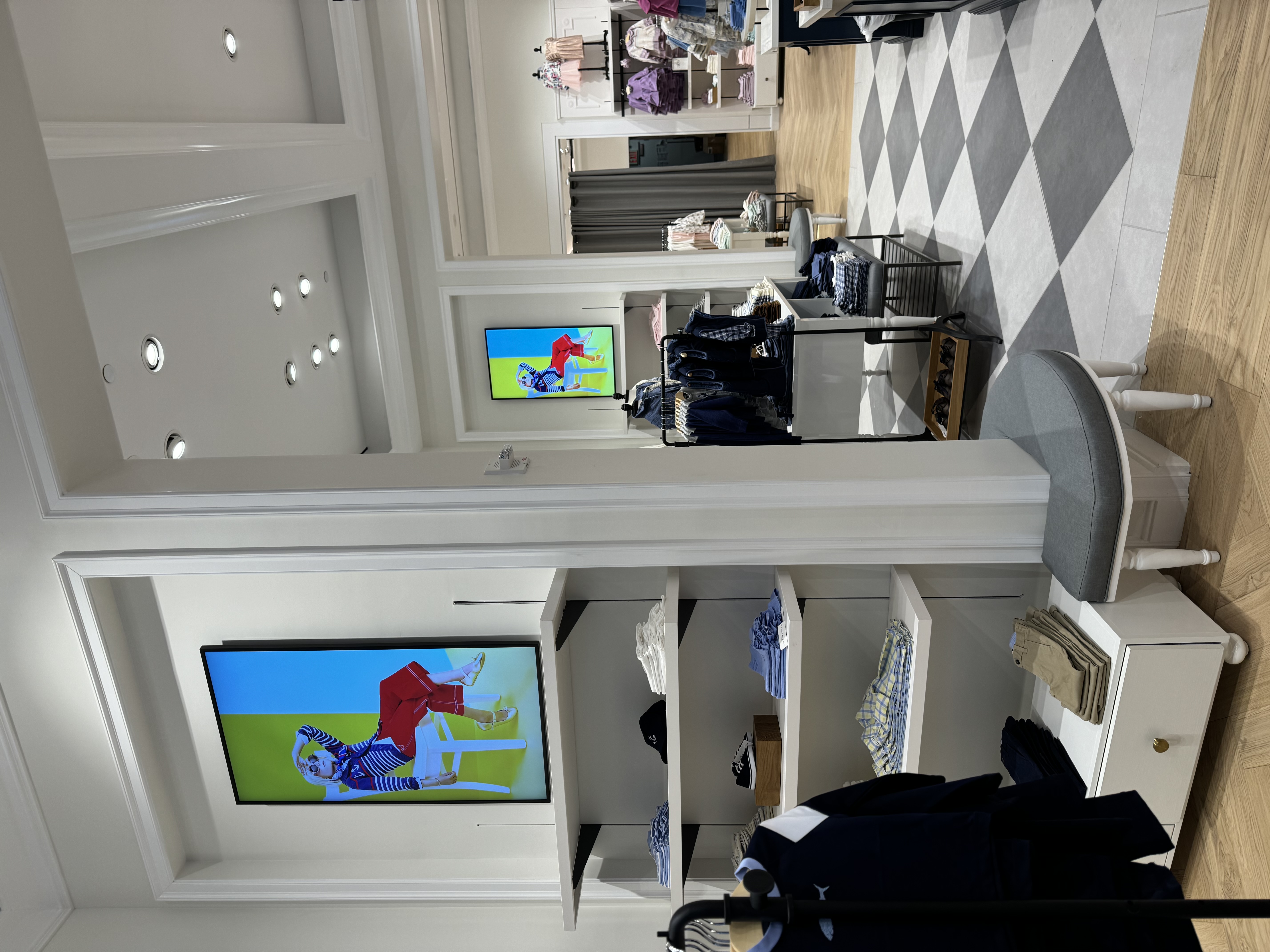 Janie and Jack synchronized digital window display in mall storefront